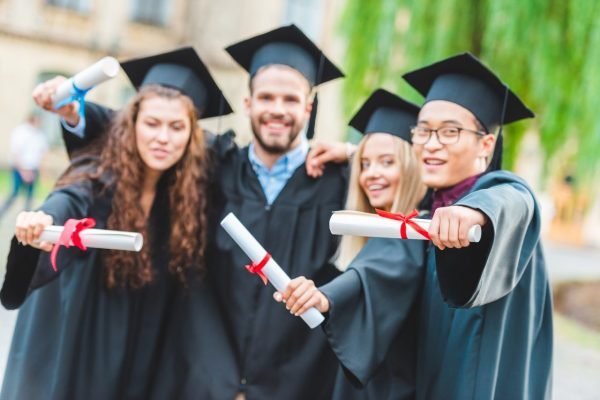 portrait-of-happy-multiracial-graduates-with-diplomas-on-street.jpg portrait-of-happy-multiracial-graduates-with-diplomas-on-street.jpg