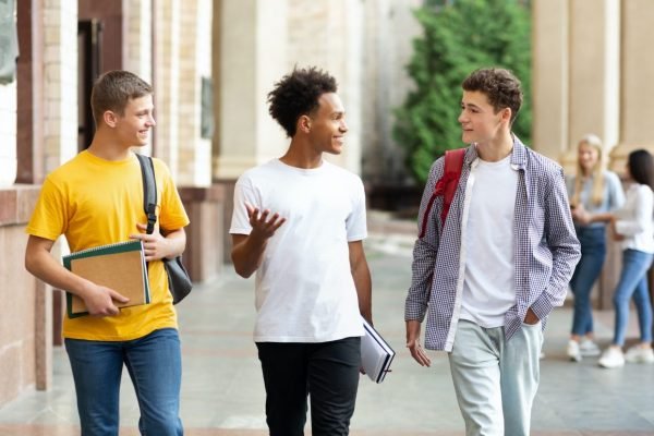 university-life-guys-walking-in-campus-and-chatting.jpg university-life-guys-walking-in-campus-and-chatting.jpg